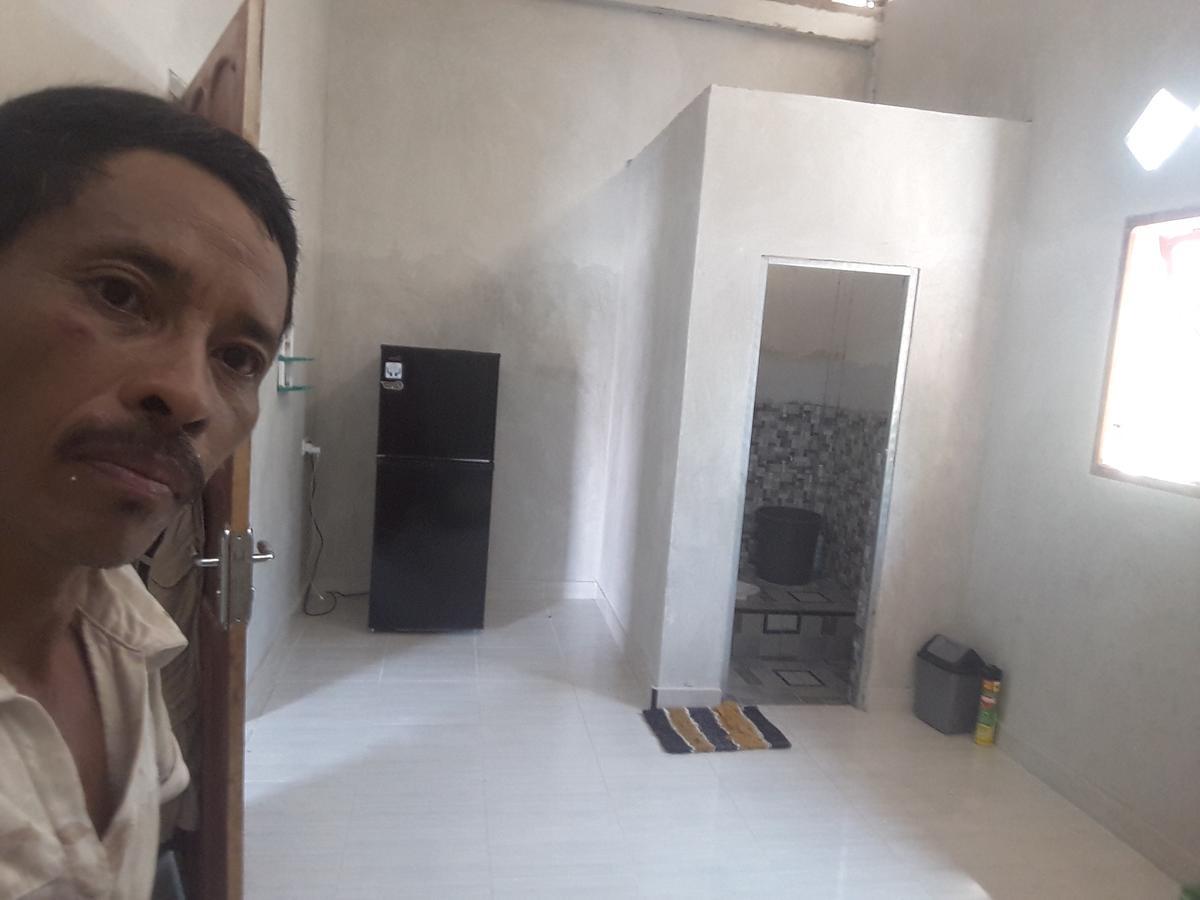 Penginapan Asidik Bira Exterior foto