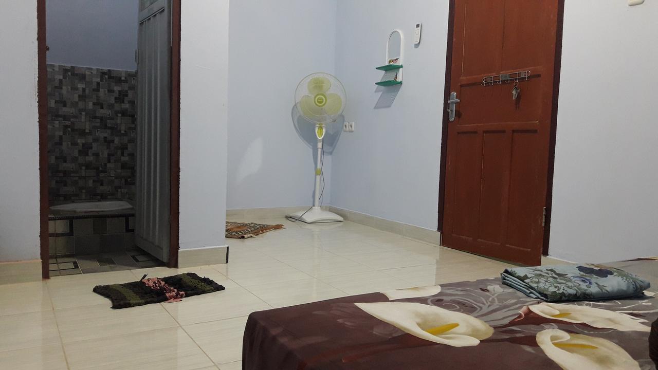 Penginapan Asidik Bira Exterior foto